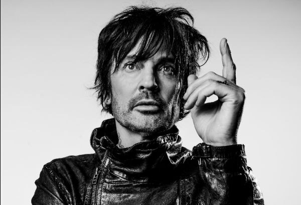 Tommy Lee Gets “Wrapped” By His Wife Brittany Furlan