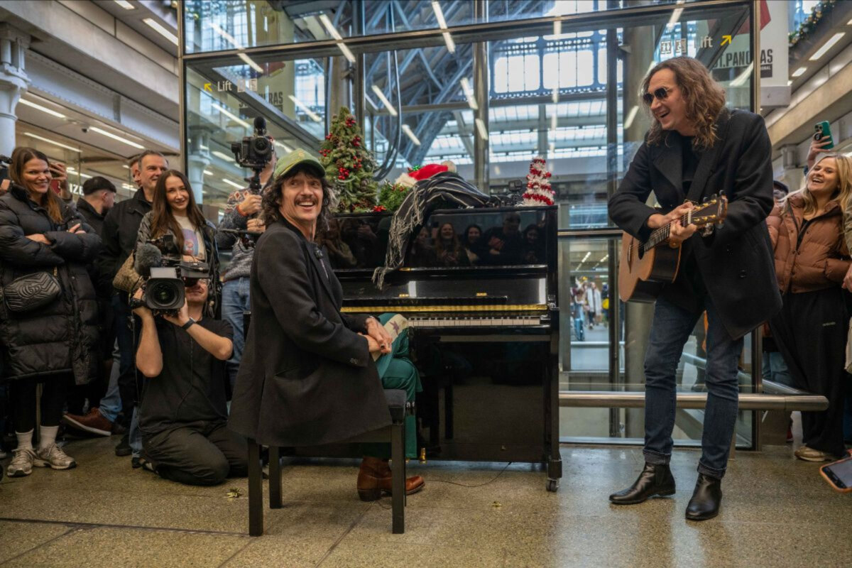 The Darkness make surprise live appearance at London St. Pancras International station