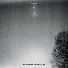 Tashi Dorji - low clouds hang, this land is on fire 