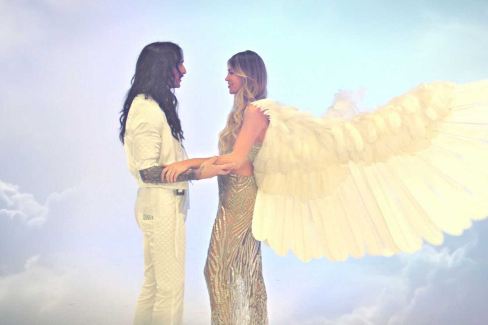 The Darkness enlist angel Abbey Clancy for 'In Another Life' video