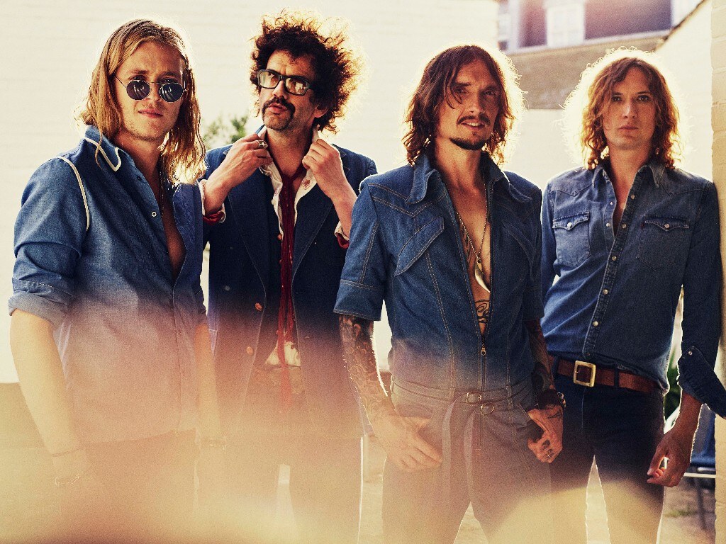 Taylor Swift powers The Darkness to No.1 in USA
