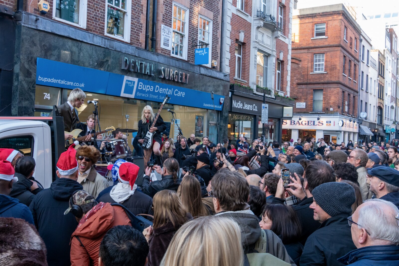 The Molotovs shut down street with Christmas guerilla gig in support of the Big Issue