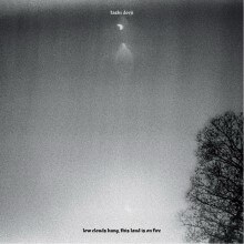 Tashi Dorji - low clouds hang, this land is on fire 
