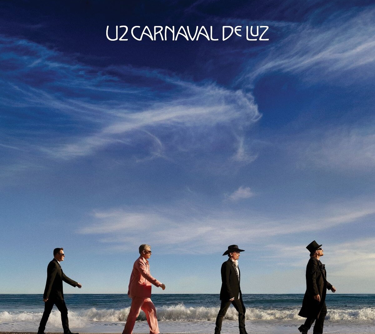 U2 celebrate 50 years and deliver a school yard concert for 1000 students and staff,