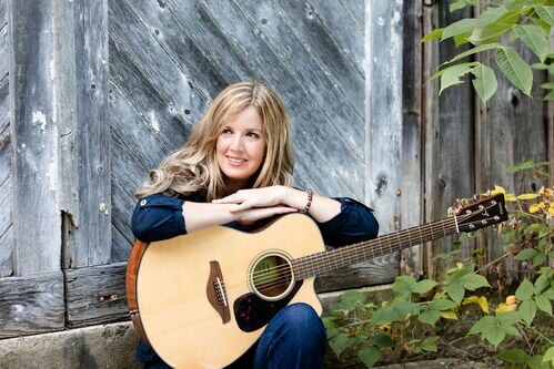 Folk Troubadour Aynsley Saxe Walks a Tightrope Over Stormy Water on "Straight Into Disaster"